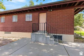 Red brick exterior with concrete foundation