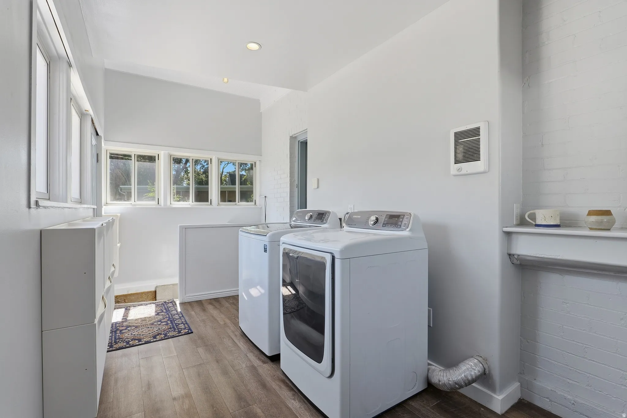 Wood-finish flooring with white walls