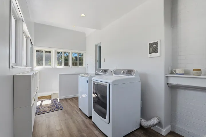 Wood-finish flooring with white walls