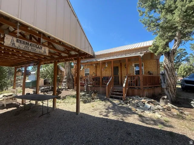 Covered carport with metal roof and exposed wood framing