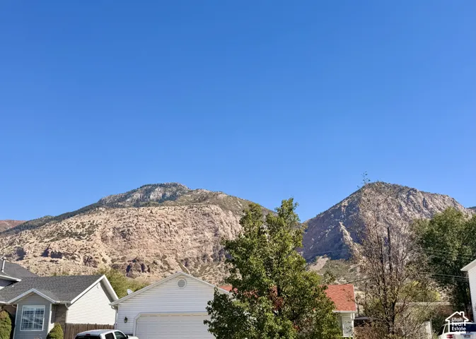 Mountain backdrop with a clear blue sky