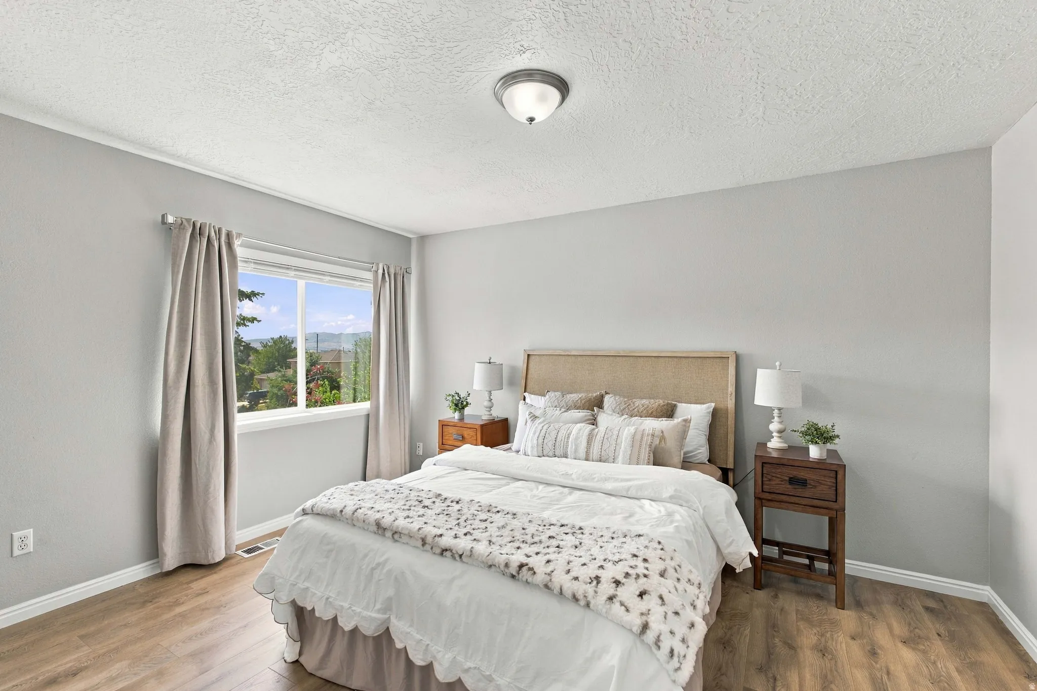 Third large bedroom with plenty of natural light and plenty of room.