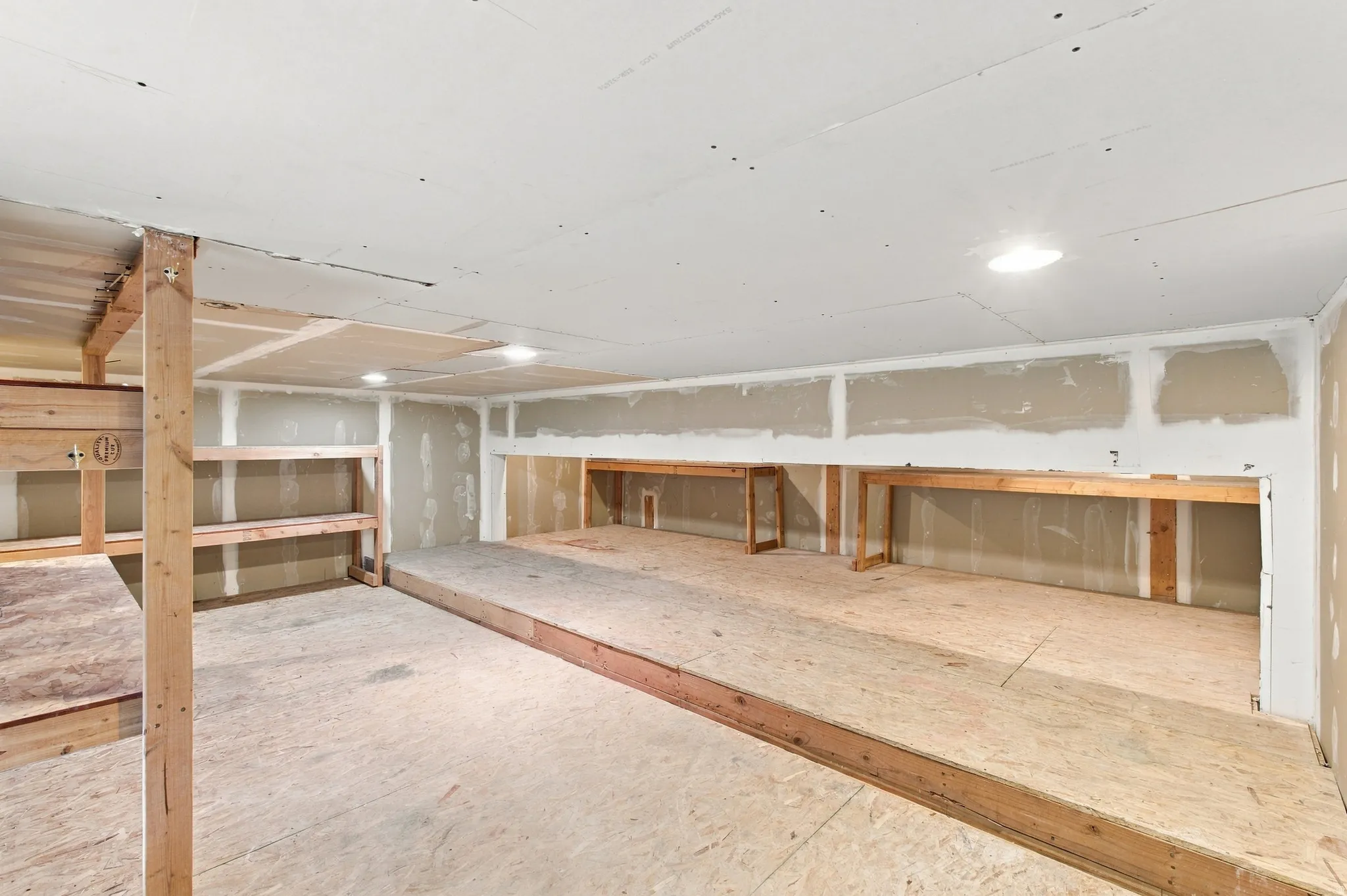 The garage is so tall that we had a loft built for extra storage.