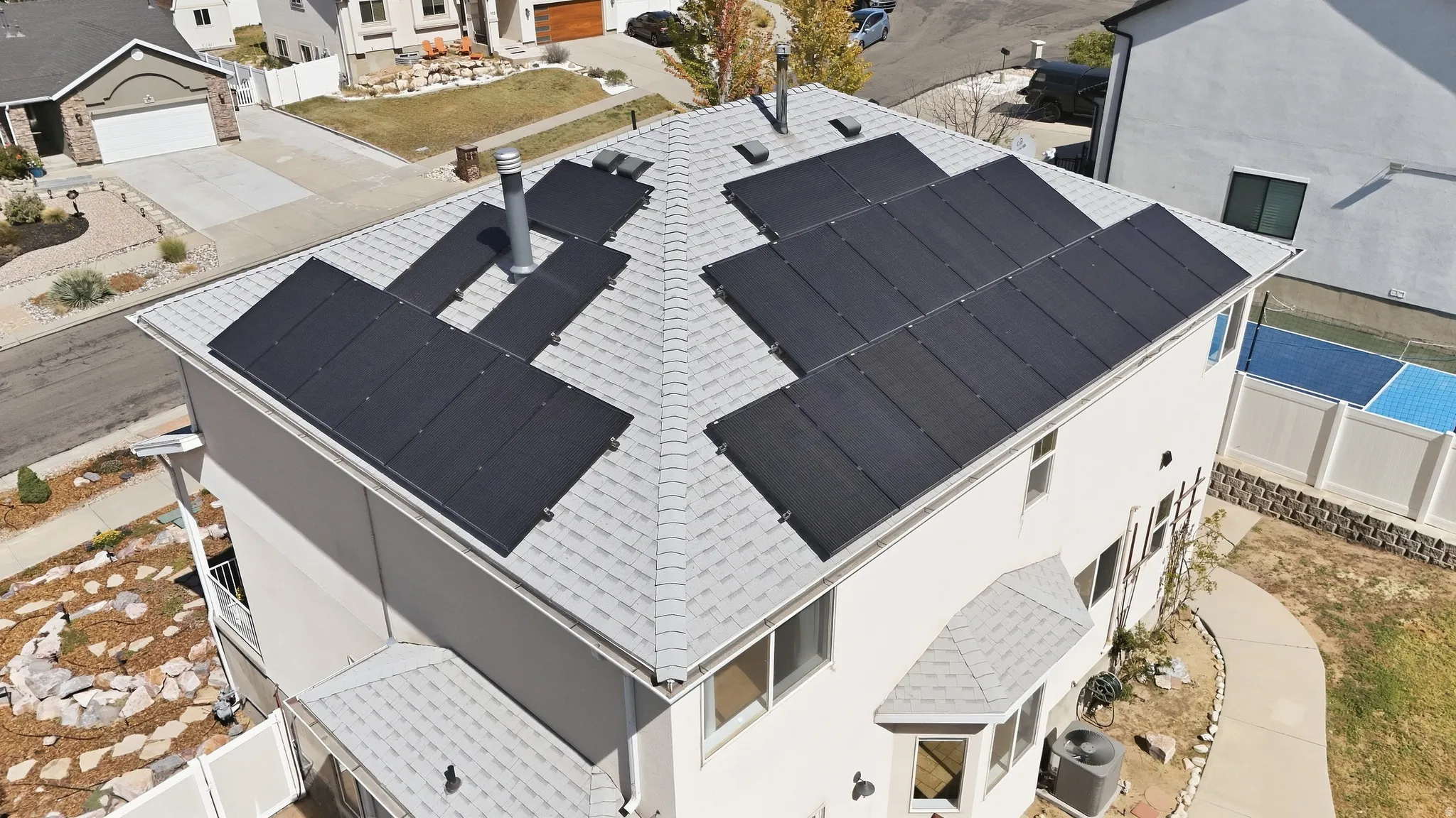 27 paid off solar array sitting on a very nice, light colored roof.  This solar array provides a lot of electricity!