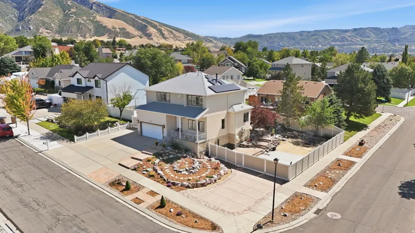 Exceptional corner lot, two story beautifully landscaped and loved home.