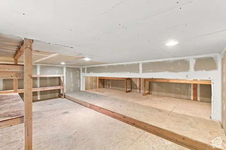 The garage is so tall that we had a loft built for extra storage.