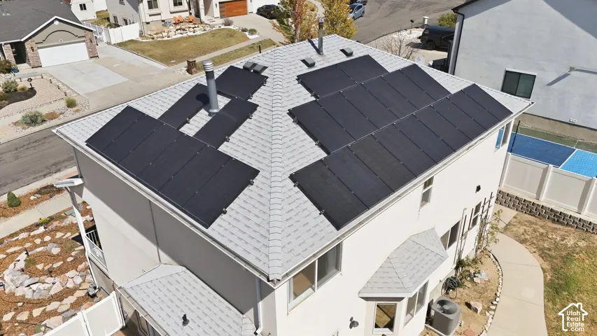 27 paid off solar array sitting on a very nice, light colored roof.  This solar array provides a lot of electricity!
