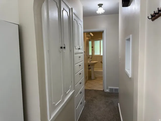 Integrated built-in cabinetry and drawers for storage
