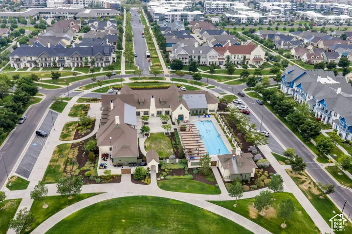 Community green spaces, established street trees, mature landscaping, community swimming pool, and a structured outdoor pergola