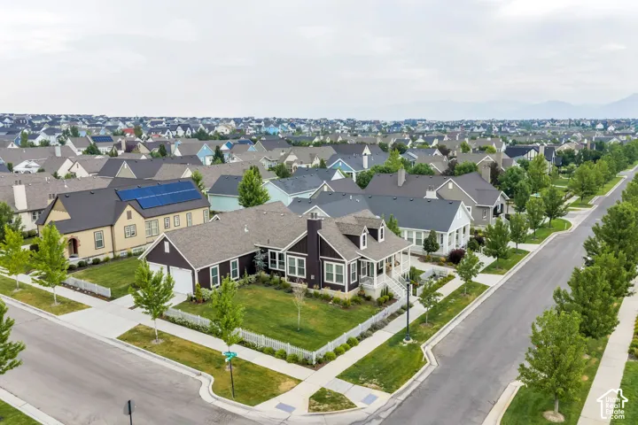 Tree-lined streets with sidewalks, well-kept lawns, and a variety of architectural styles