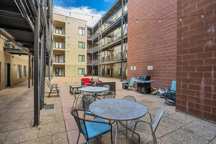 Expansive central courtyard featuring a paver stone surface