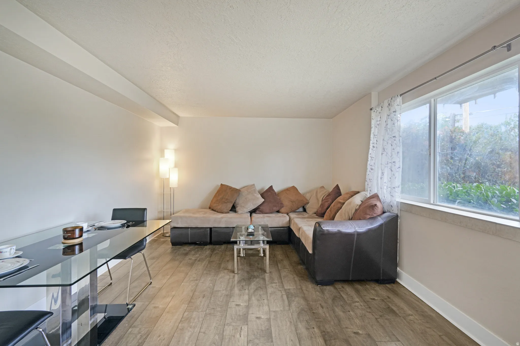 Wood-finish flooring throughout the main living area