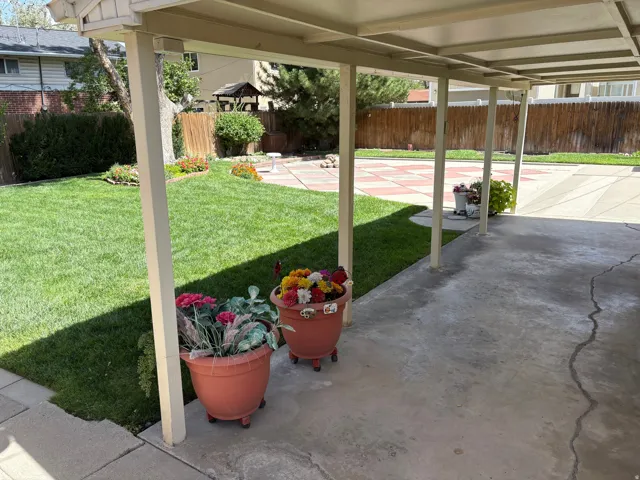 Covered patio with a concrete surface
