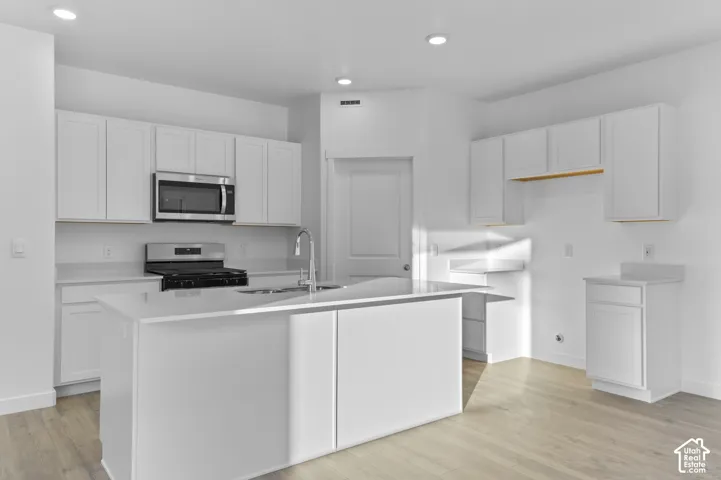 Pictures are of a finished home of the same floor plan, and the available home may contain different options, upgrades, and exterior color and/or elevation style.