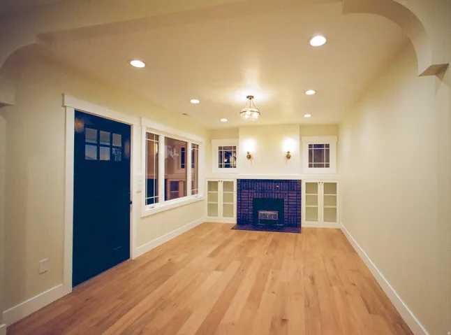 Light wood-finish flooring with recessed lighting