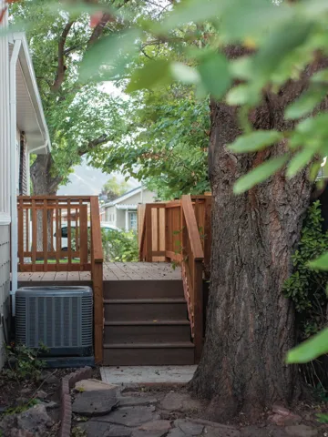 Wood-finish deck with matching railings and stairs