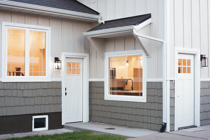 Board and batten siding with cedar shake accents