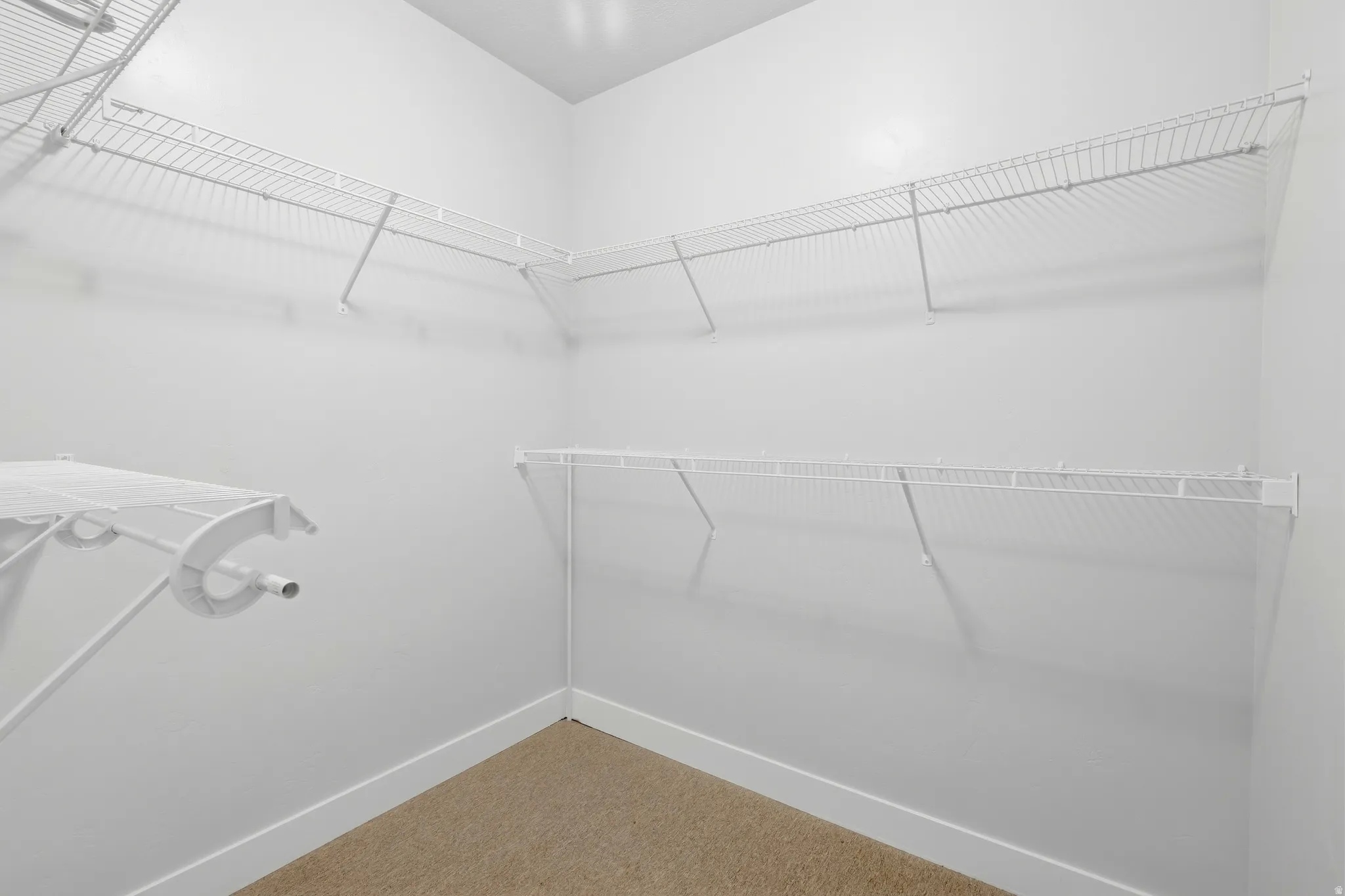 White wire shelving system providing ample storage