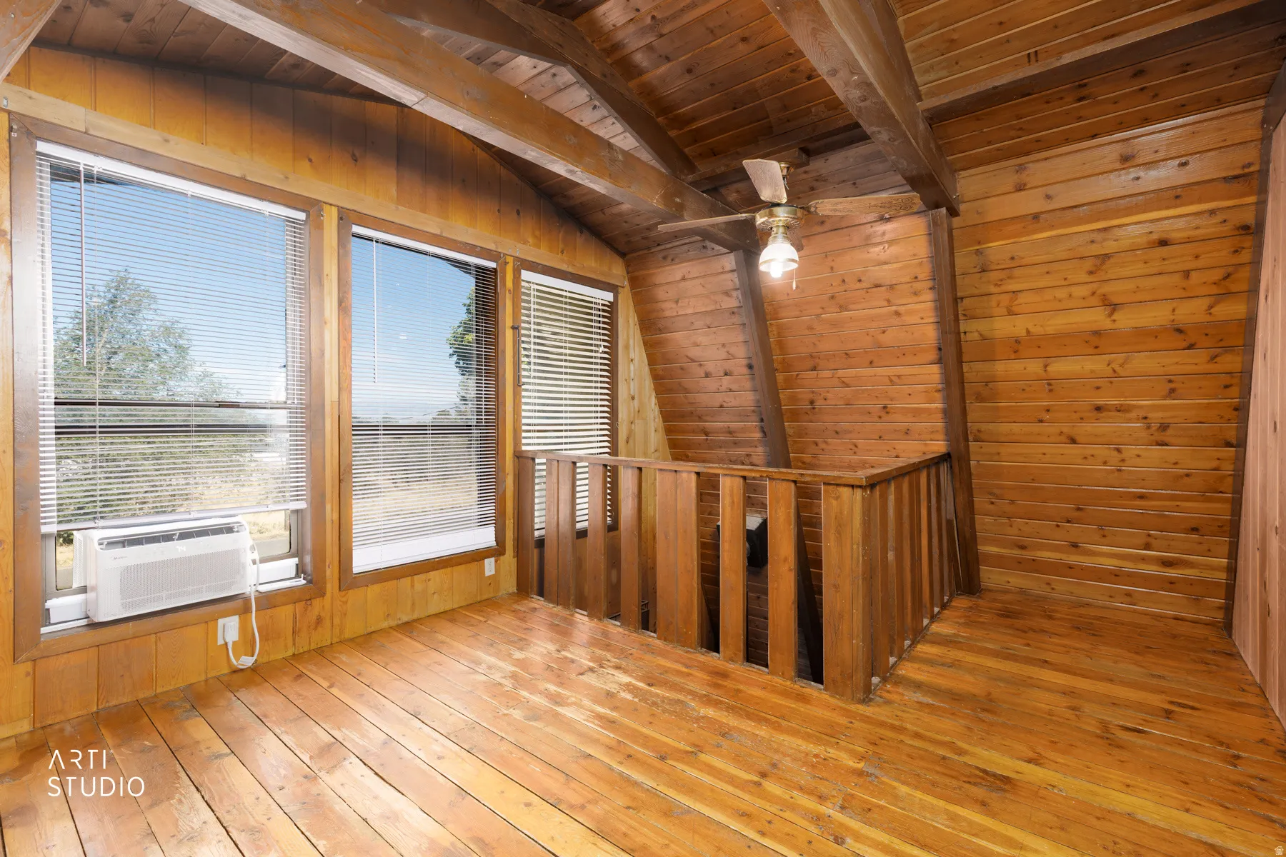 Vaulted wood-paneled ceilings with exposed beams