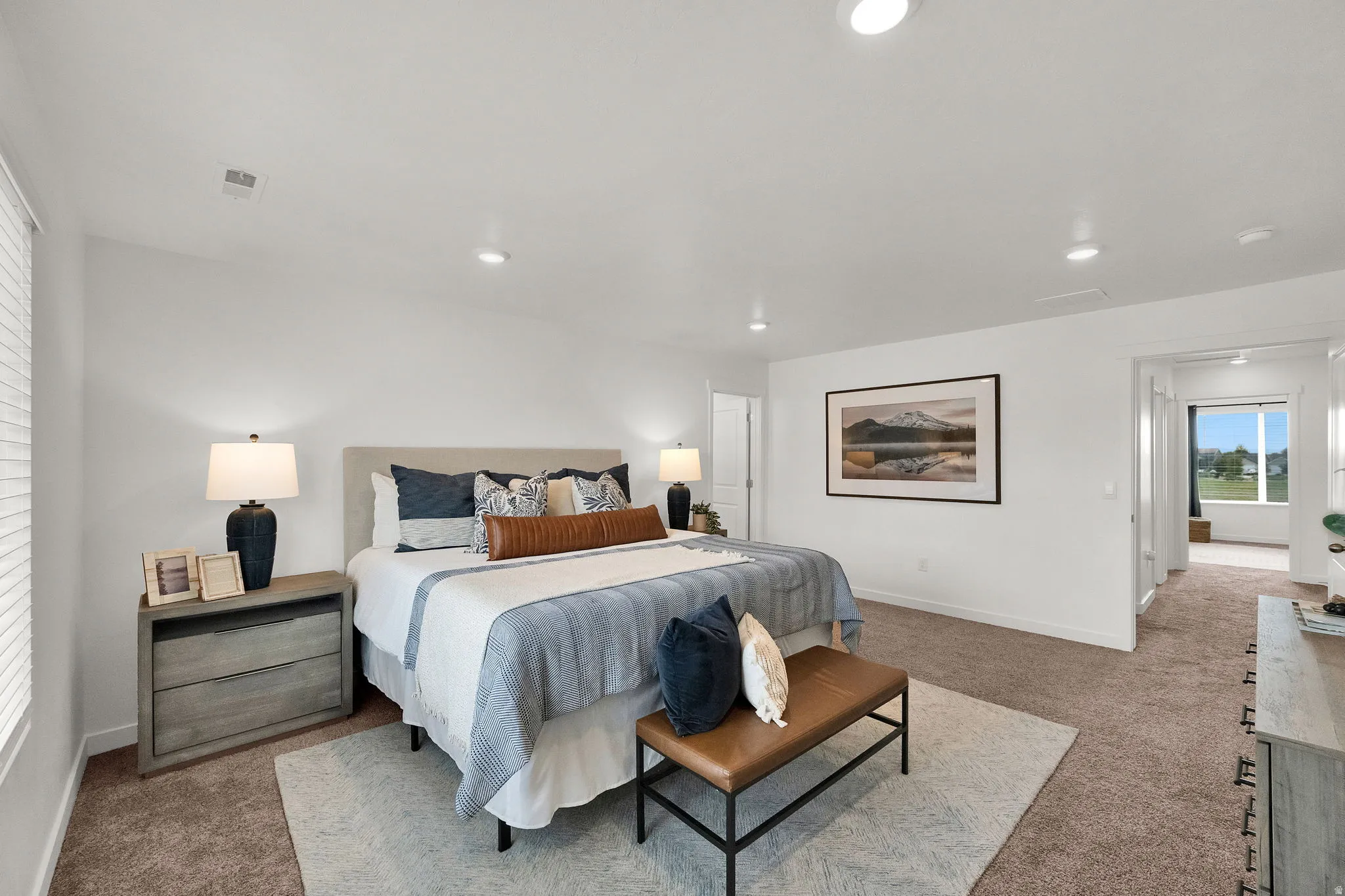 White walls paired with recessed lighting