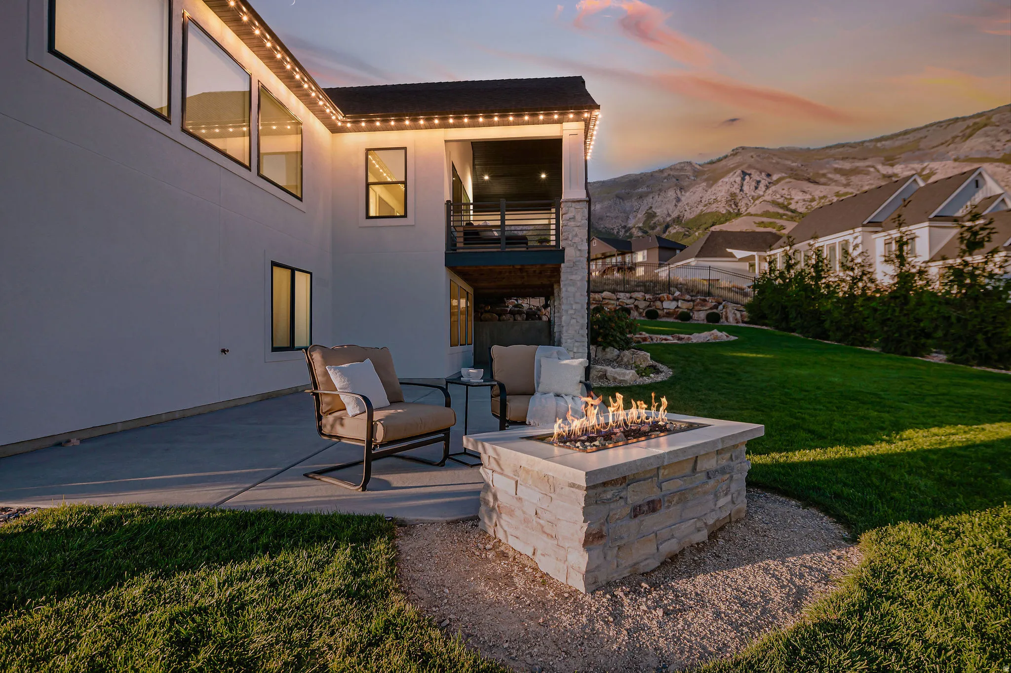 Stone-clad Gas Fire pit and a Covered Upper-Level Deck Makes for the Best Time Enjoying Evening Sunsets