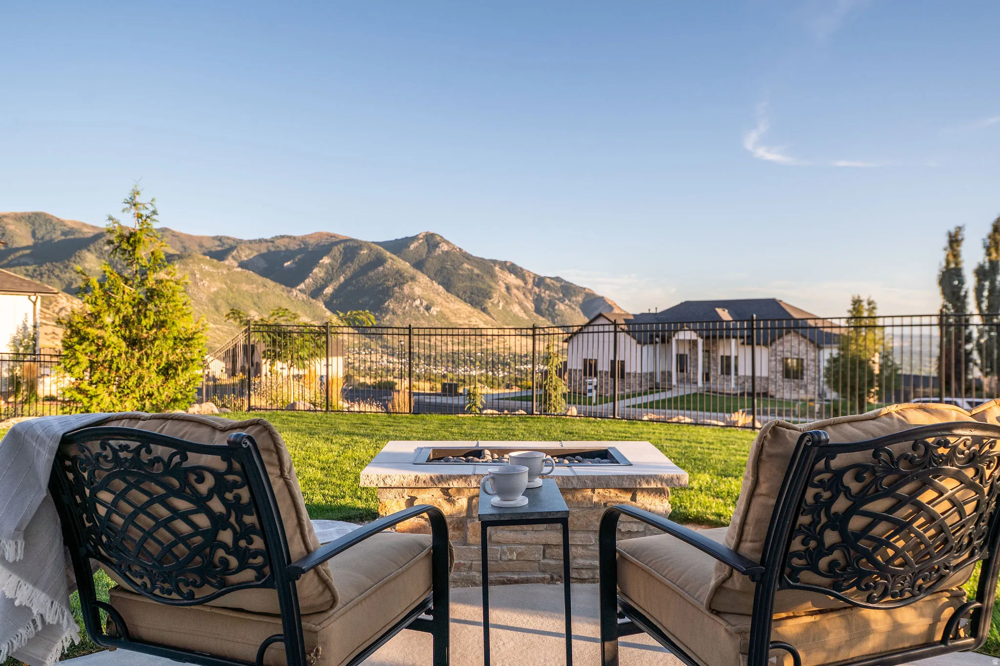 Built-in Stone Fire Pit with Mountain Views