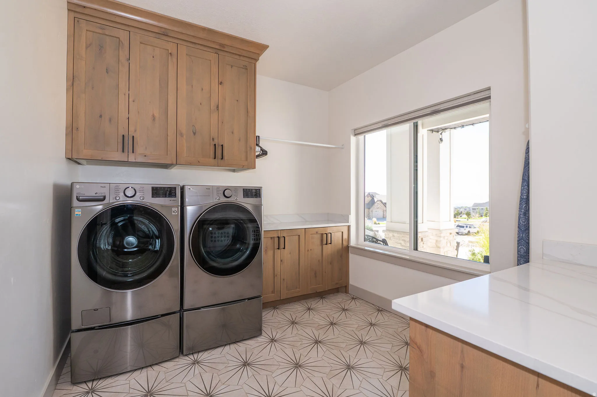 Laundry Room with Cabinetry & Folding Counters