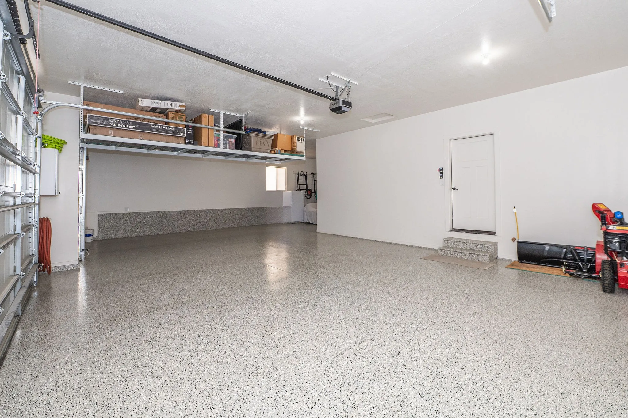 4 Car Garage with Epoxy-coated Flooring & Overhead Storage Racks