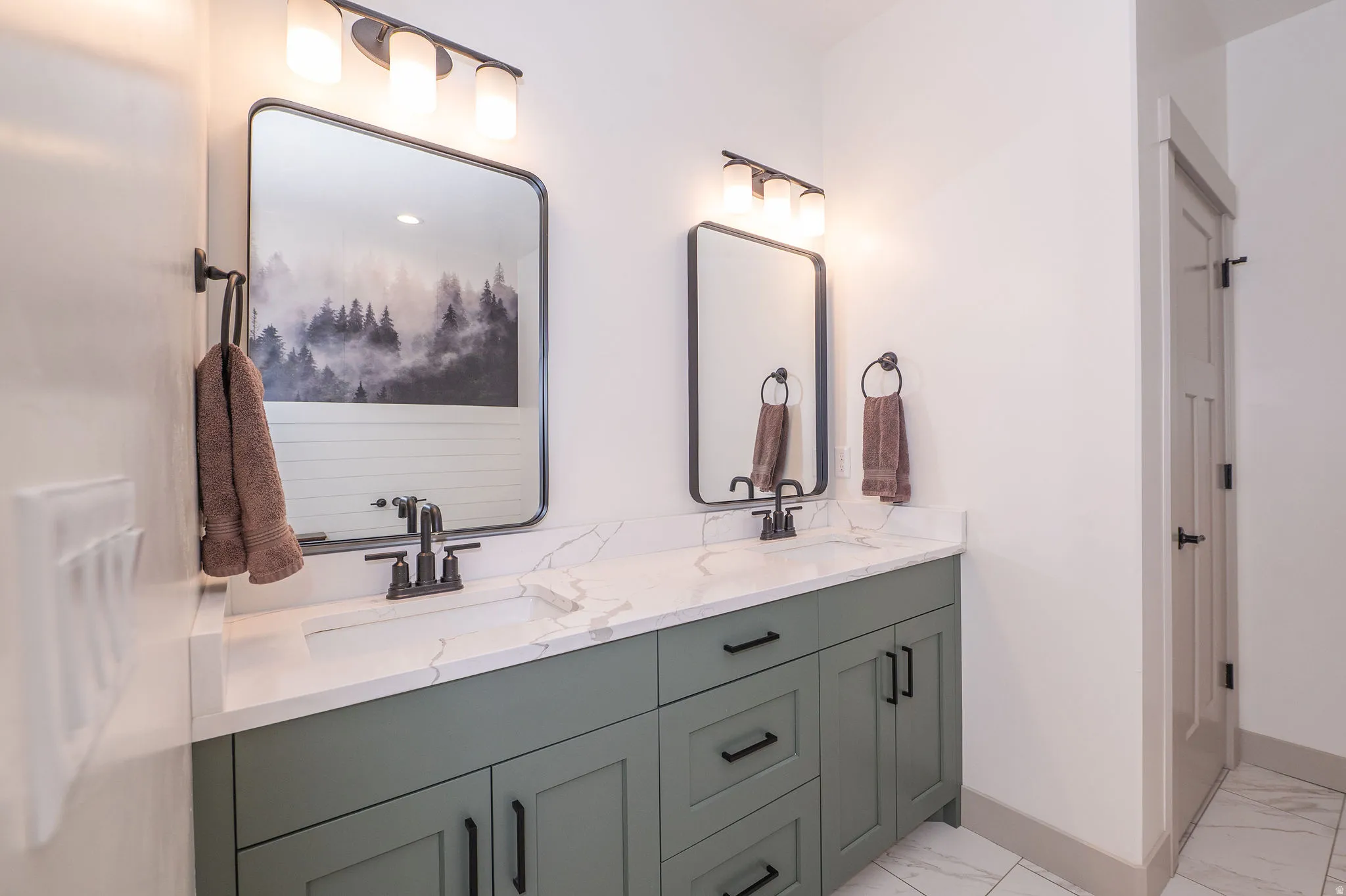 Primary Bathroom with Dual Undermount Sinks with Matte Black Faucets And Toilet Closet