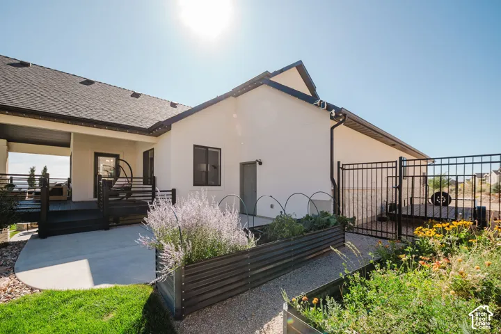 Raised Garden Beds, Fully Fenced Backyard, and Gravel RV Parking Pad