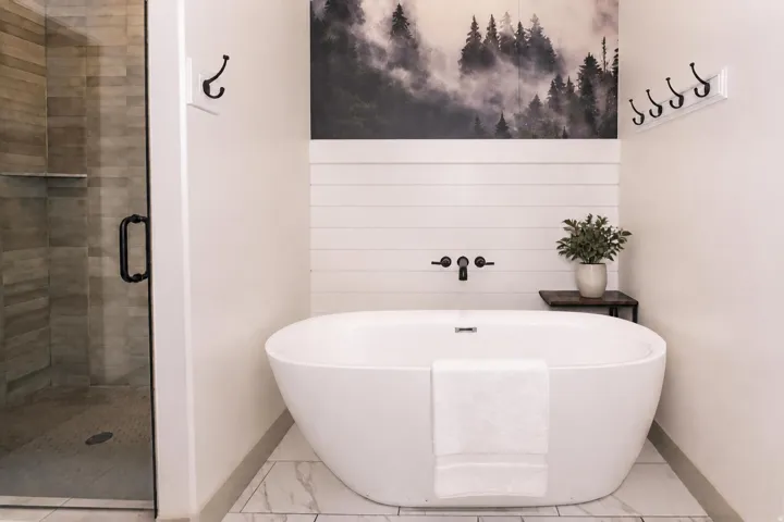 Primary Bathroom with Freestanding Tub and Tiled Shower with Double Shower Heads