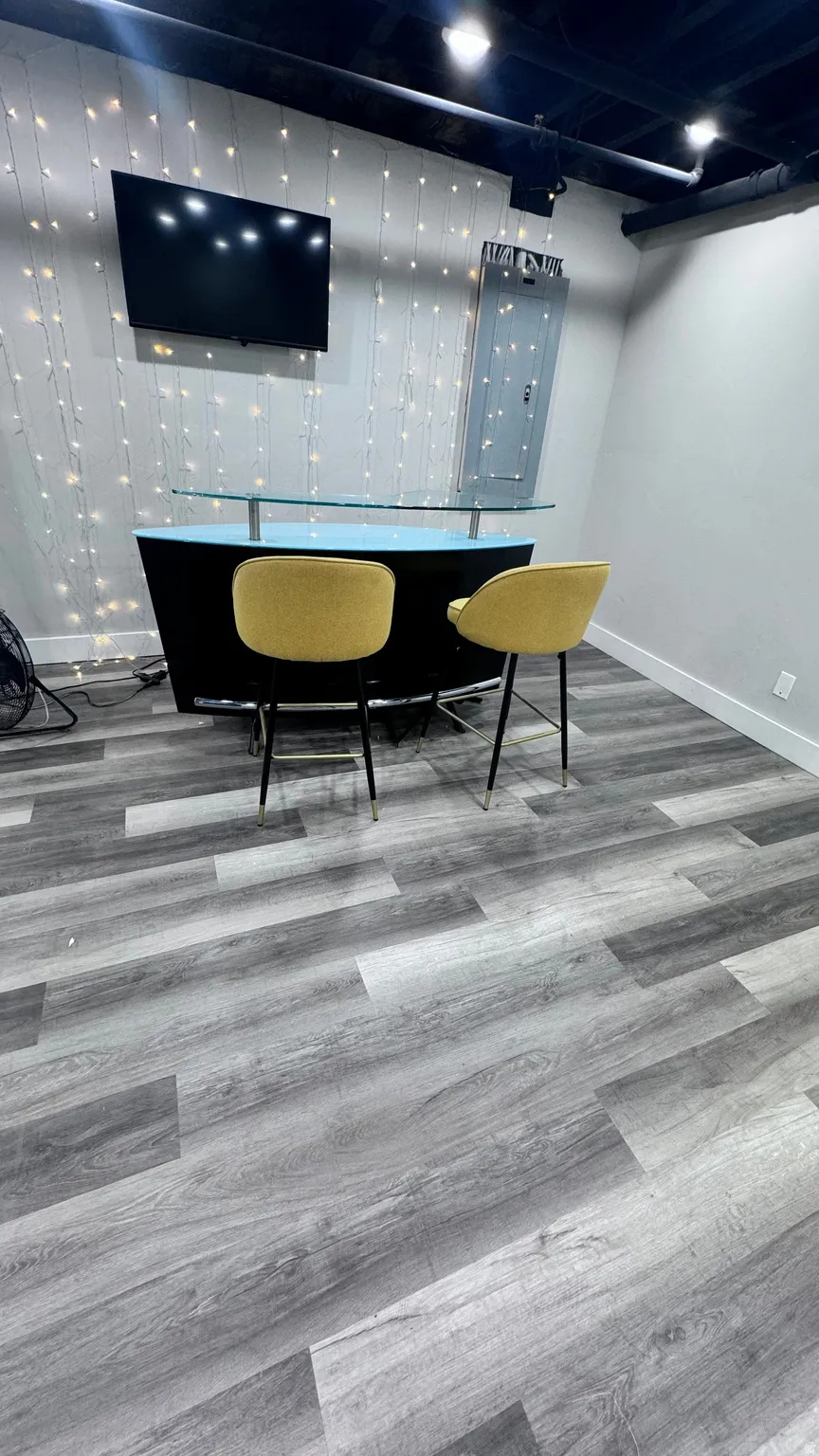 Wood-finish plank flooring throughout
