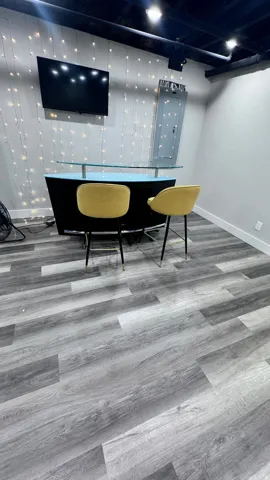 Wood-finish plank flooring throughout