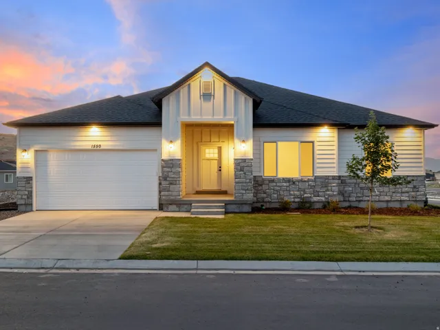 Modern exterior with stone accents and horizontal siding