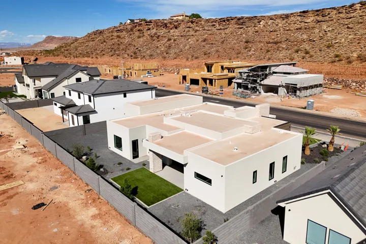 Modern flat roof architecture with white stucco exterior