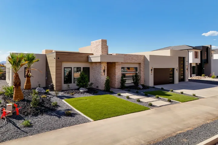 Modern exterior architecture featuring a flat roof and stucco finish
