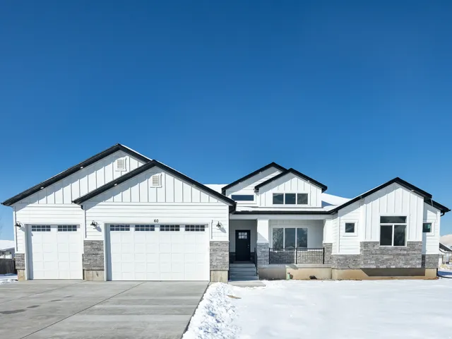White exterior siding with board and batten accents