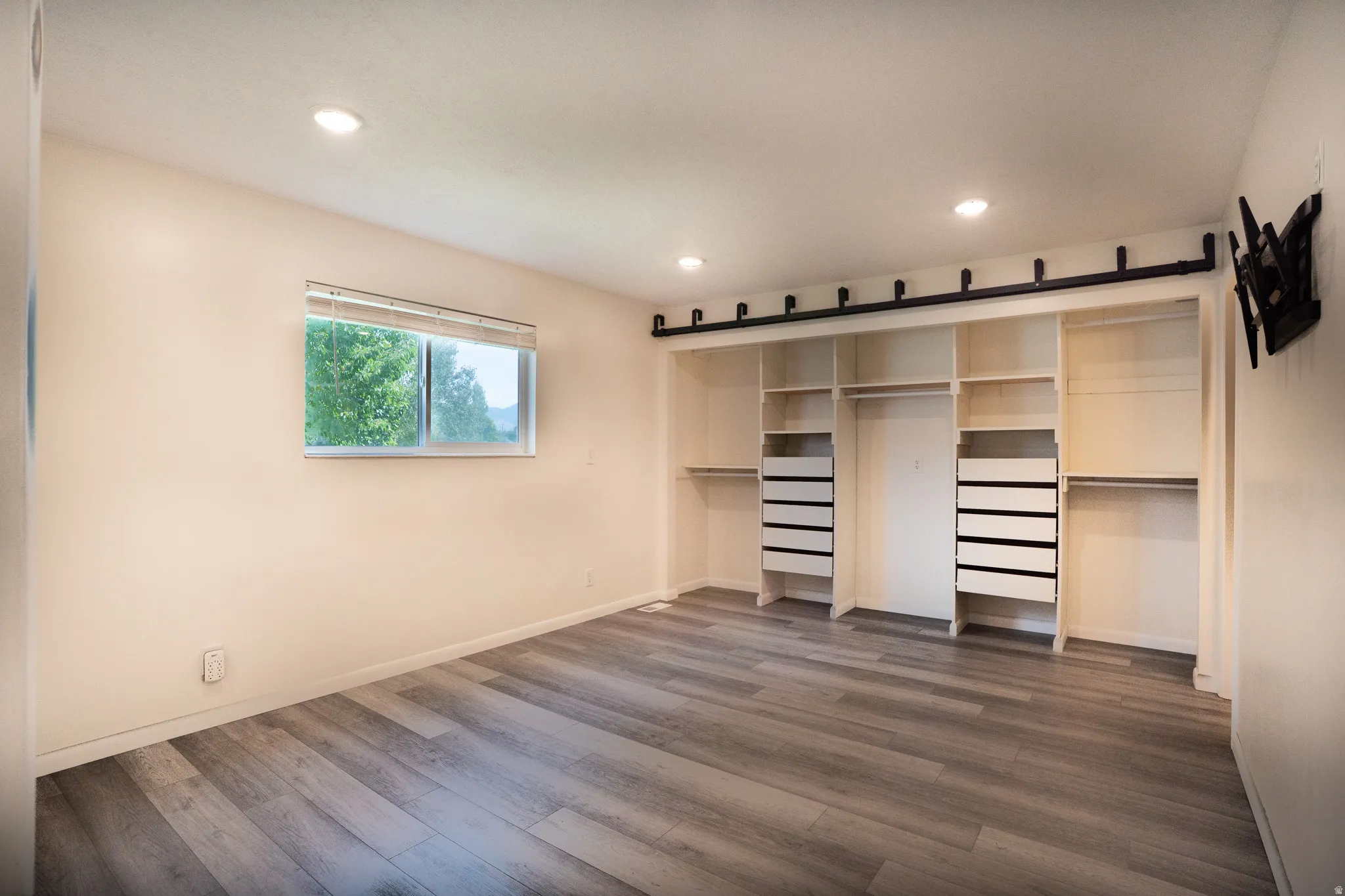 Built in closet drawers and dresser in primary room.