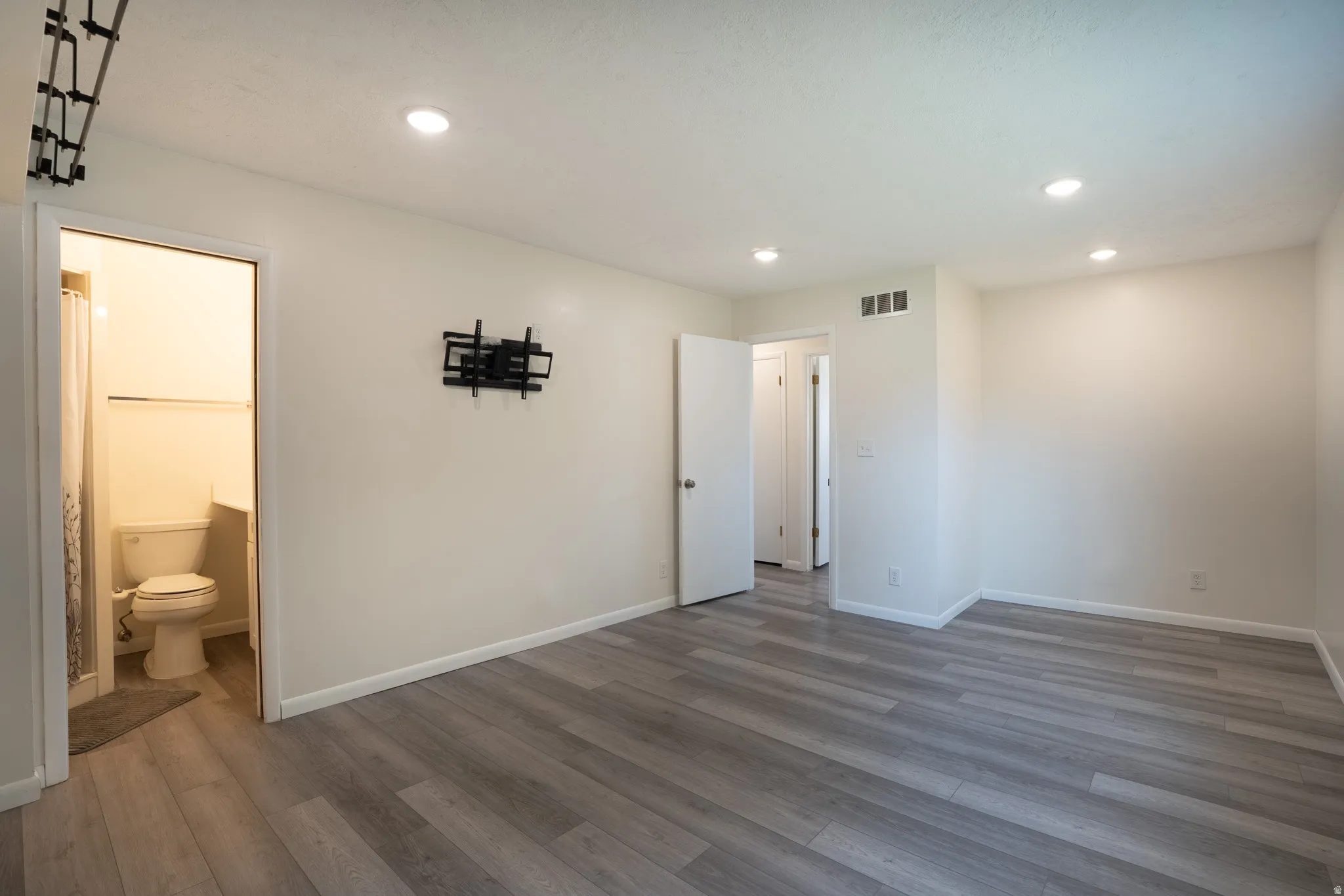 Primary bedroom suite with sitting area