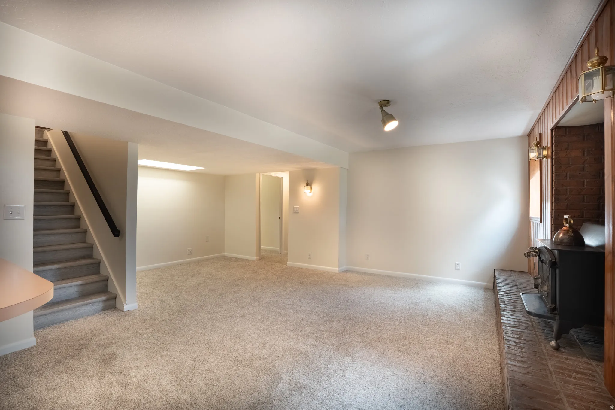 New paint, carpet, and baseboards.