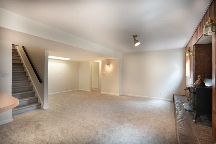 New paint, carpet, and baseboards.