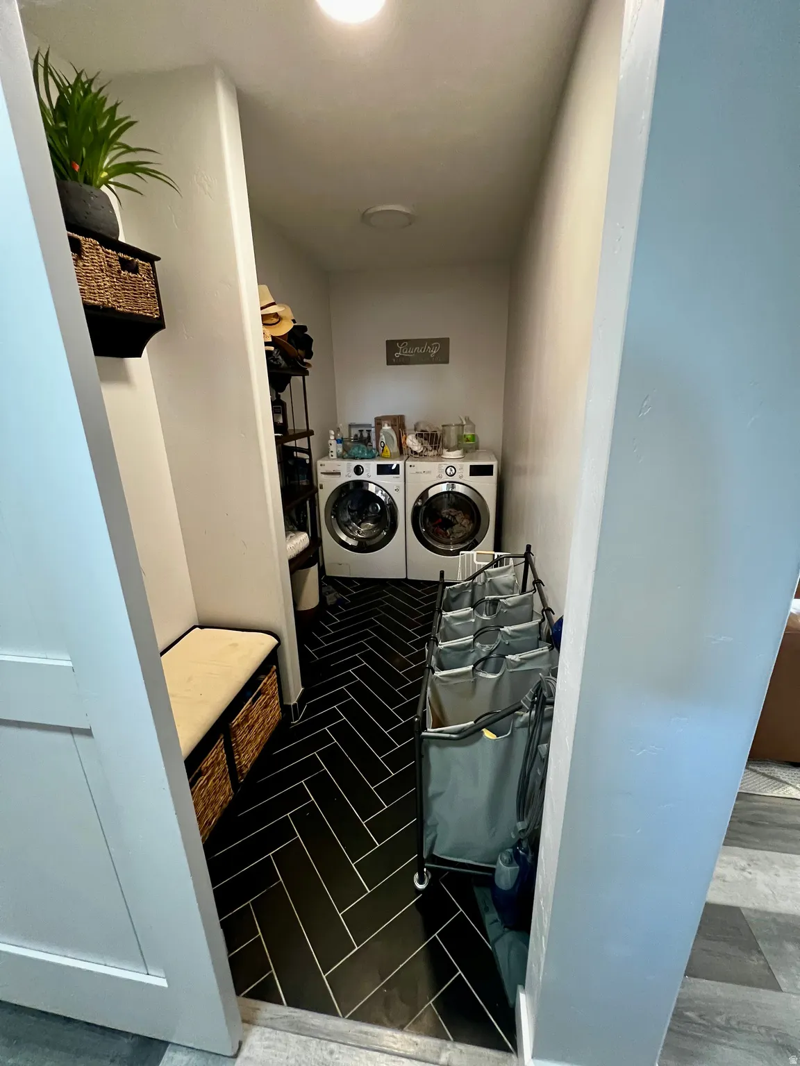 Black herringbone tile flooring