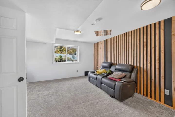 Accent wall featuring vertical wood slat detailing