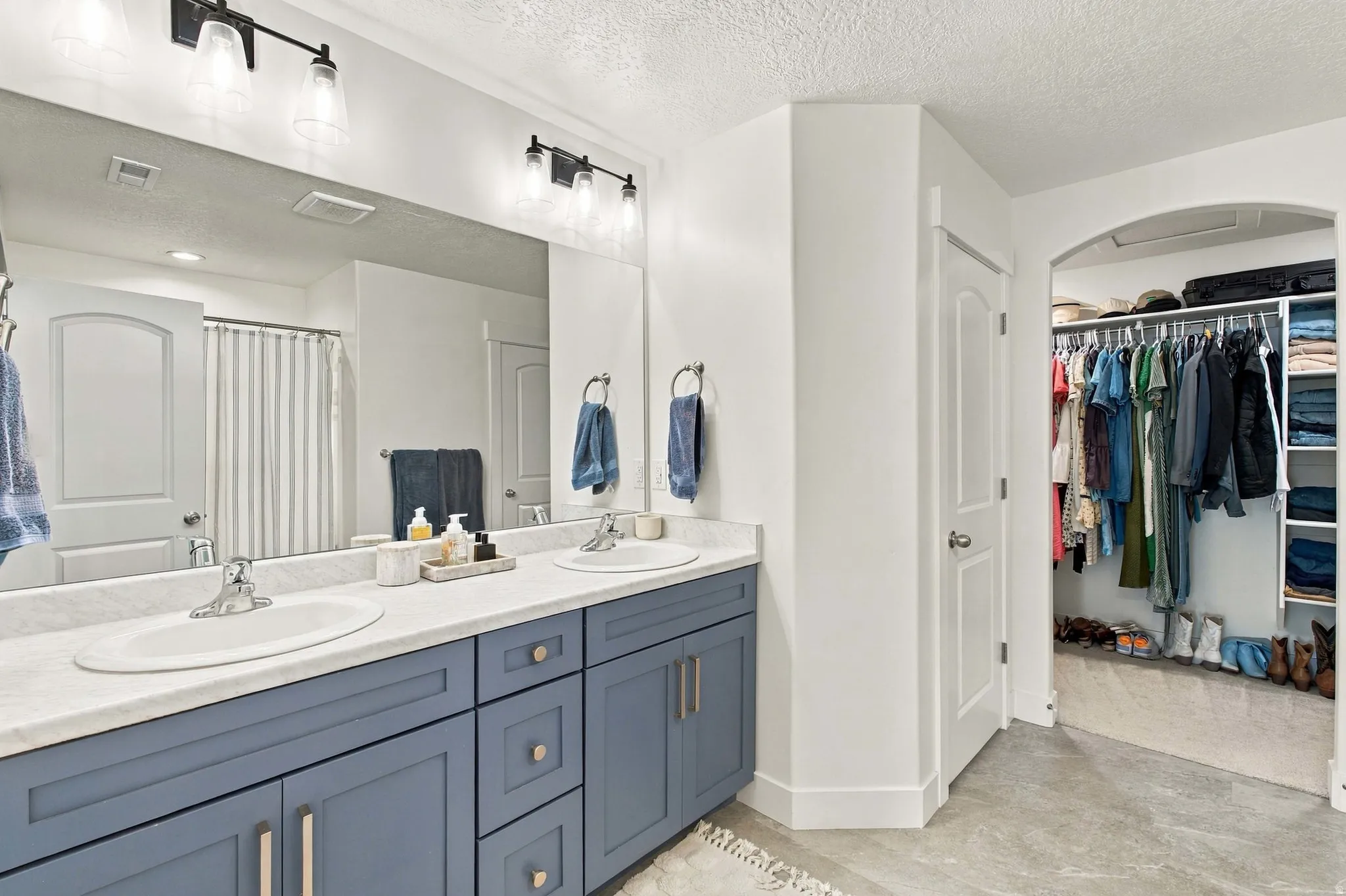 Primary Bathroom, dual vanity with integrated sinks, Walk-in closet