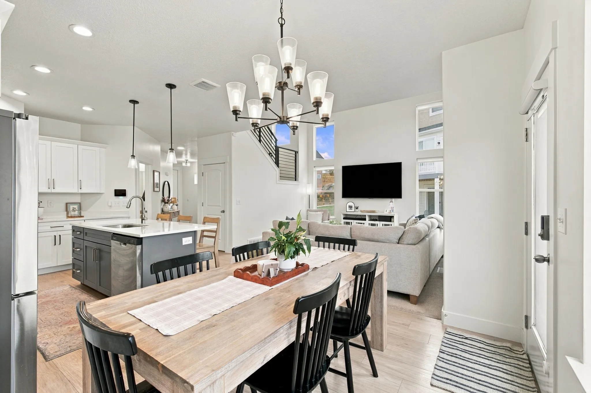 Kitchen with a central island, stainless steel appliances, and pendant lighting