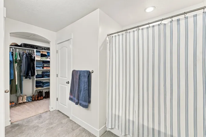 Primary Bathroom, dual vanity with integrated sinks, Walk-in closet