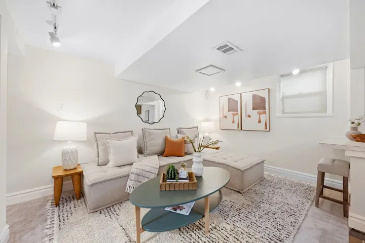 Recessed lighting, track lighting, and a window provide illumination