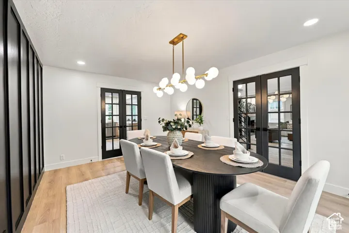 Wood-finish flooring with a decorative area rug
