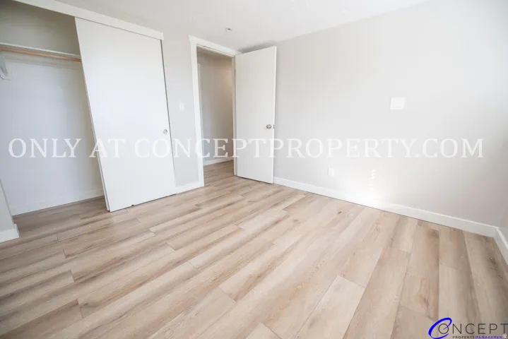 Wood-finish flooring with white trim