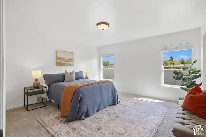 Recessed windows, neutral wall tones, and overhead lighting
